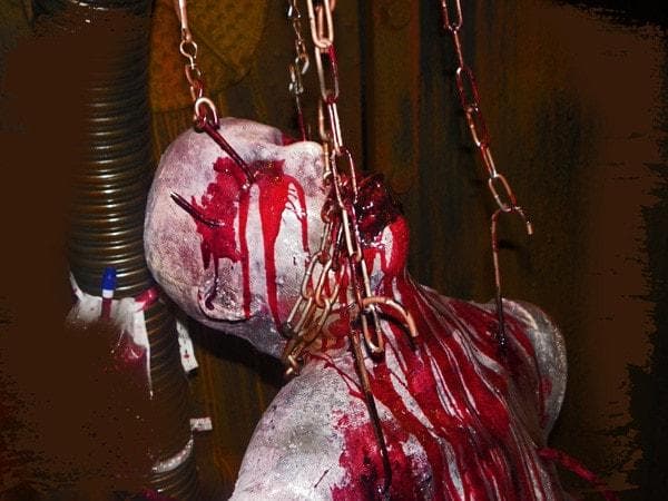 "Chained and Drained" Bloody Human Body Prop