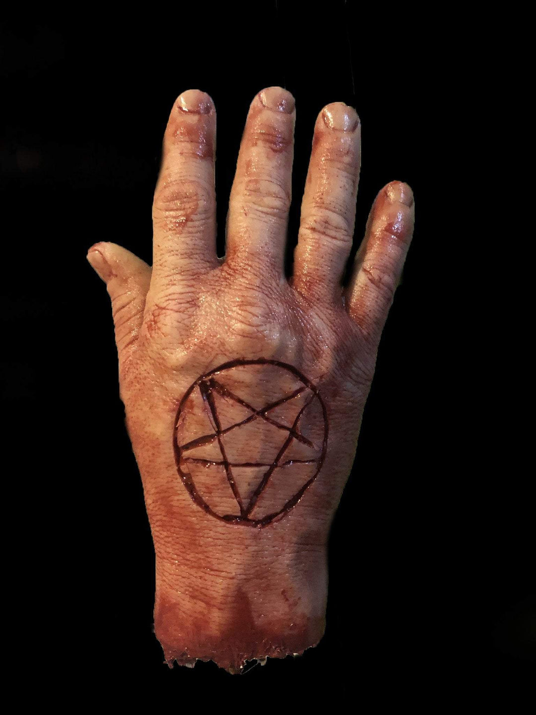 "Severed Male Hand with Pentagram - Silicone" Human Body Part Halloween Prop