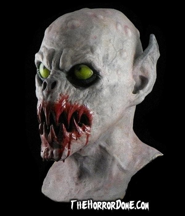 Detailed Feast Monster mask with blood-covered sharp teeth