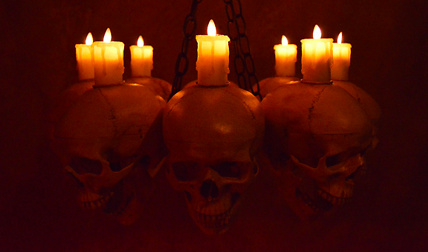 "Skull Chandelier with 8 Skulls and Flameless Candles" Haunted House Lighting